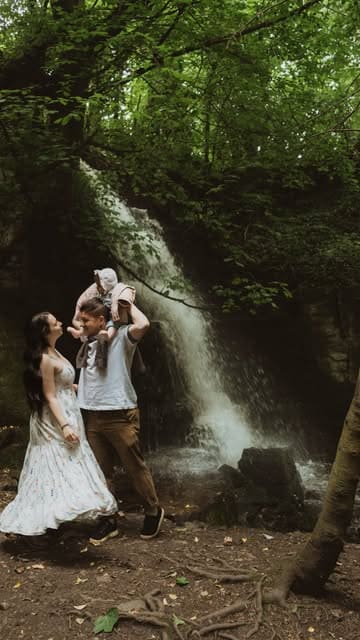 A short, aesthetic montage featuring a couple and their baby visiting Harmby Waterfall in Yorkshire. The video captures the walk to the waterfall and various shots of the couple posing in front of the cascade.