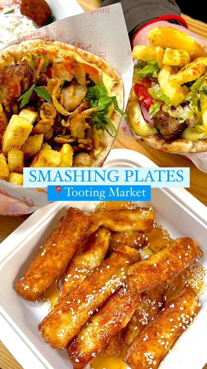 The video showcases a visit to Smashing Plates at Tooting Market. It features various Greek dishes including pork souvlaki, chicken gyros, maple halloumi, courgette and feta balls, feta fries, and baklava. The food is presented in paper wraps and containers, emphasizing its takeaway nature. The presentation is visually appealing, highlighting colors and textures.  The primary focus is on showcasing the food and expressing a positive experience.