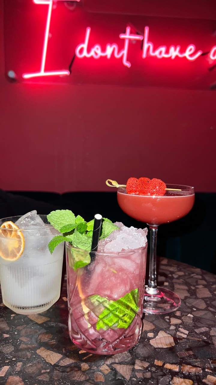 The video showcases a night out at Tequila Mockingbird, a bar in Covent Garden, London. It highlights three signature cocktails: the Calypso, The Zombie, and a Strawberry & Watermelon Martini.  The cocktails are presented in various glasses and garnished with fruit. The video focuses primarily on the cocktail preparation and the vibrant atmosphere of the bar. No specific dietary information is provided.
