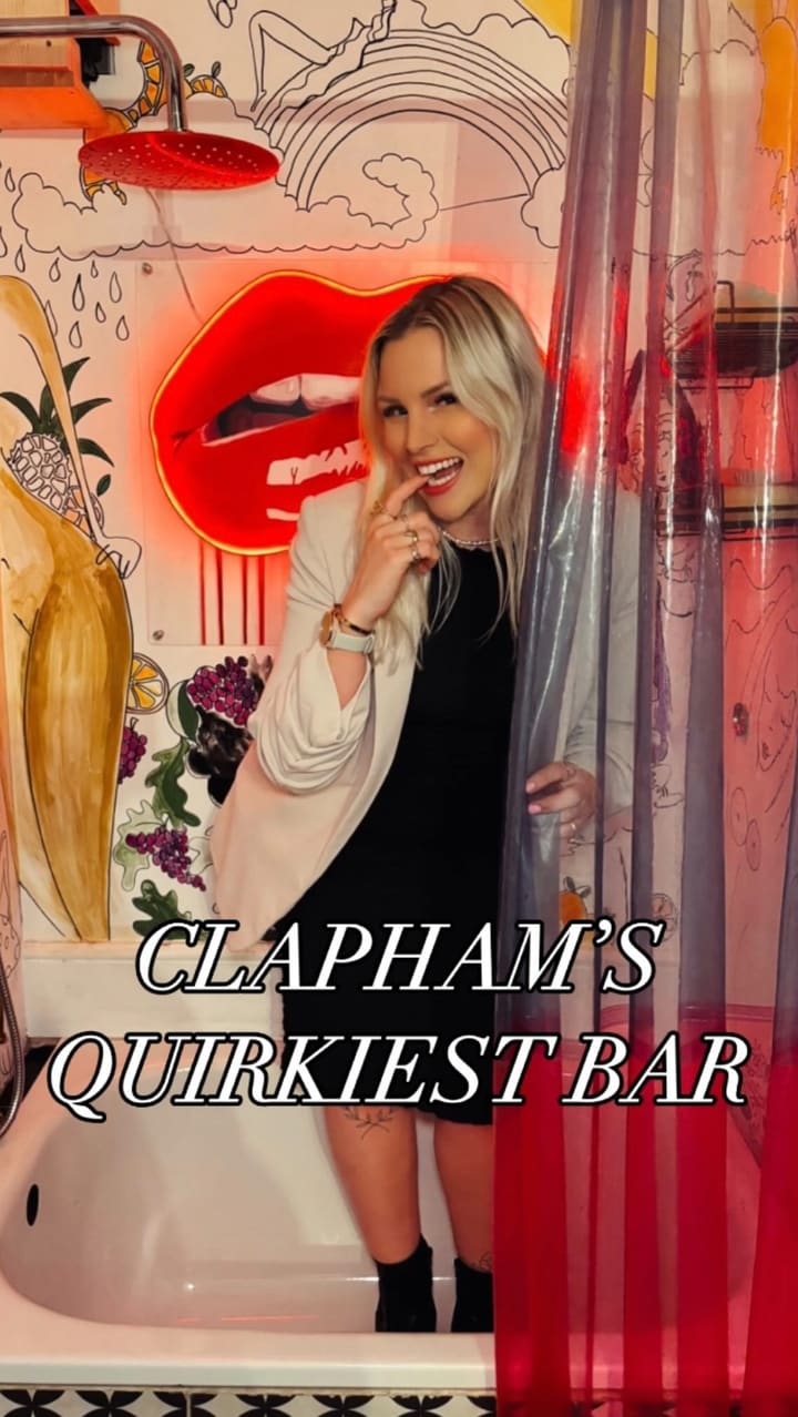 This video showcases The Little Orange Door, a bar in Clapham, London.  The video shows a woman enjoying various food and drink items, including a Negroni cocktail,  vegetable crudités with guacamole, tortilla chips, fries, and a vegan pizza with pumpkin, spinach, sweet onion, and vegan feta. The food is presented on various platters and in small bowls. The video emphasizes the bar's unique atmosphere and the quality of its vegan food options. 