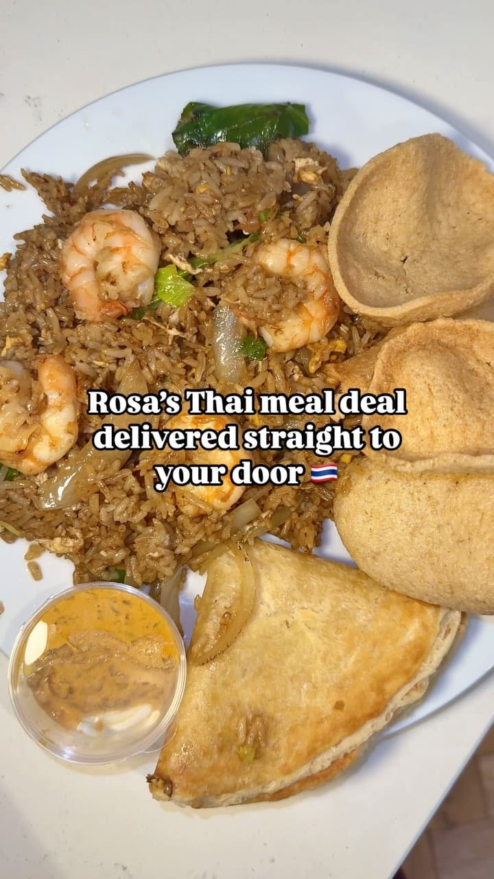 The video showcases a Thai meal deal from Rosa's Thai, ordered via Uber Eats. It features Rosa's fried prawn rice, crispy pork bites with sriracha sauce, prawn crackers, and a pastry item. The food is presented on a white plate, and the video includes close-ups of the dishes and someone eating them with a fork. The main focus is on the variety and convenience of the Thai meal deal delivered to the door.