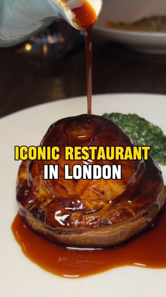 The video showcases Bluebird restaurant in Chelsea, London. It highlights a three-course meal deal with Prosecco for £23. Dishes shown include leek and potato soup, aged beef ragu pasta, wild duck pie, and sticky toffee pudding. The presentation focuses on the appetizing visual appeal of each dish, with close-up shots and overhead shots.  No specific dietary information is provided.