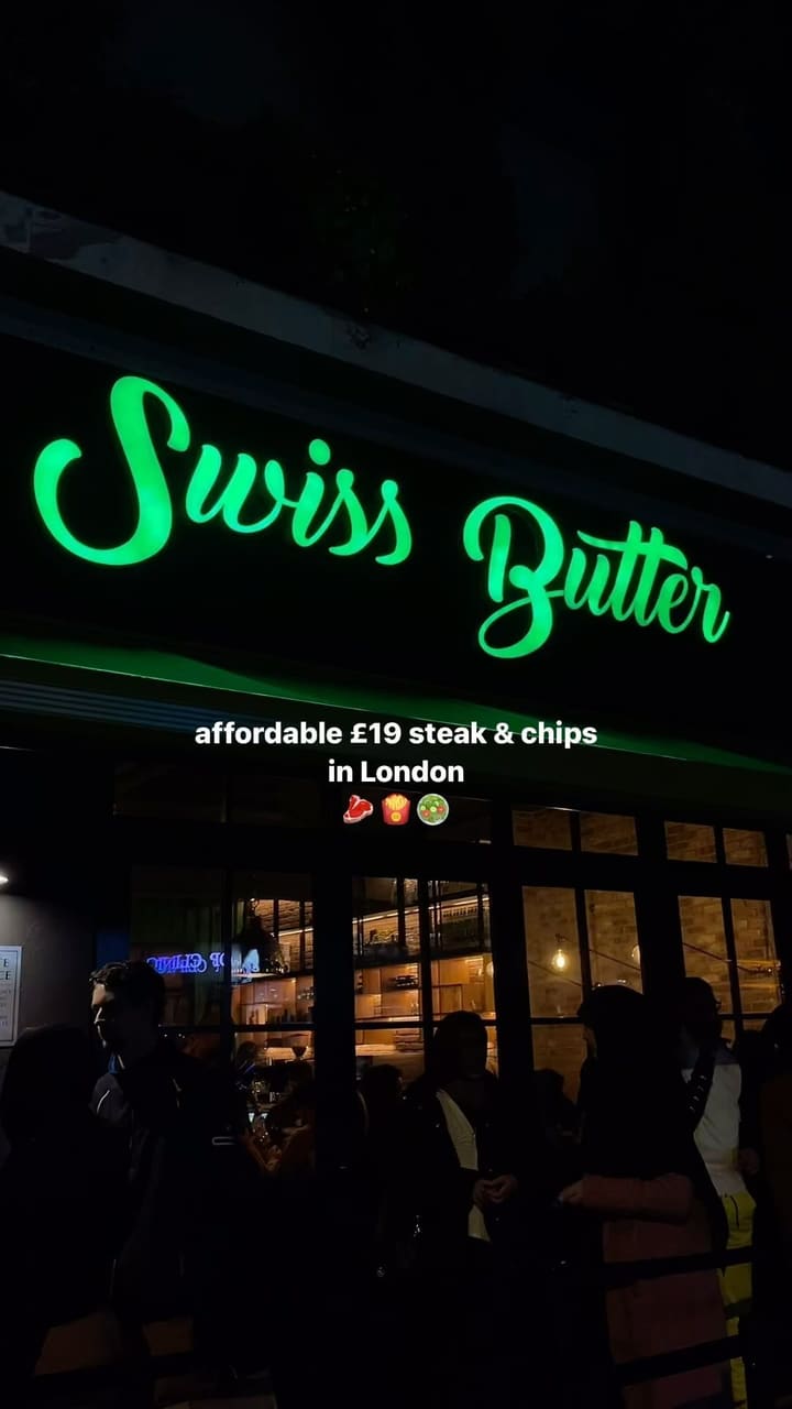 This video showcases Swiss Butter, a restaurant in Holborn, London. It features various dishes: ribeye steak, chicken, both served with a green butter sauce, chips, and salad; and desserts, including pain perdu (caramel French toast) and a molten chocolate cake.  The food is presented on wooden boards and in individual pans.  The video emphasizes that the food is halal and that alcohol is served. The main focus is on showcasing the food and the restaurant's ambiance.