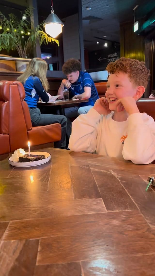 A vlog-style video showcasing a birthday celebration at TGI Fridays, highlighting the 'Everyday Trio' menu deal which includes an appetizer, main, and drink.