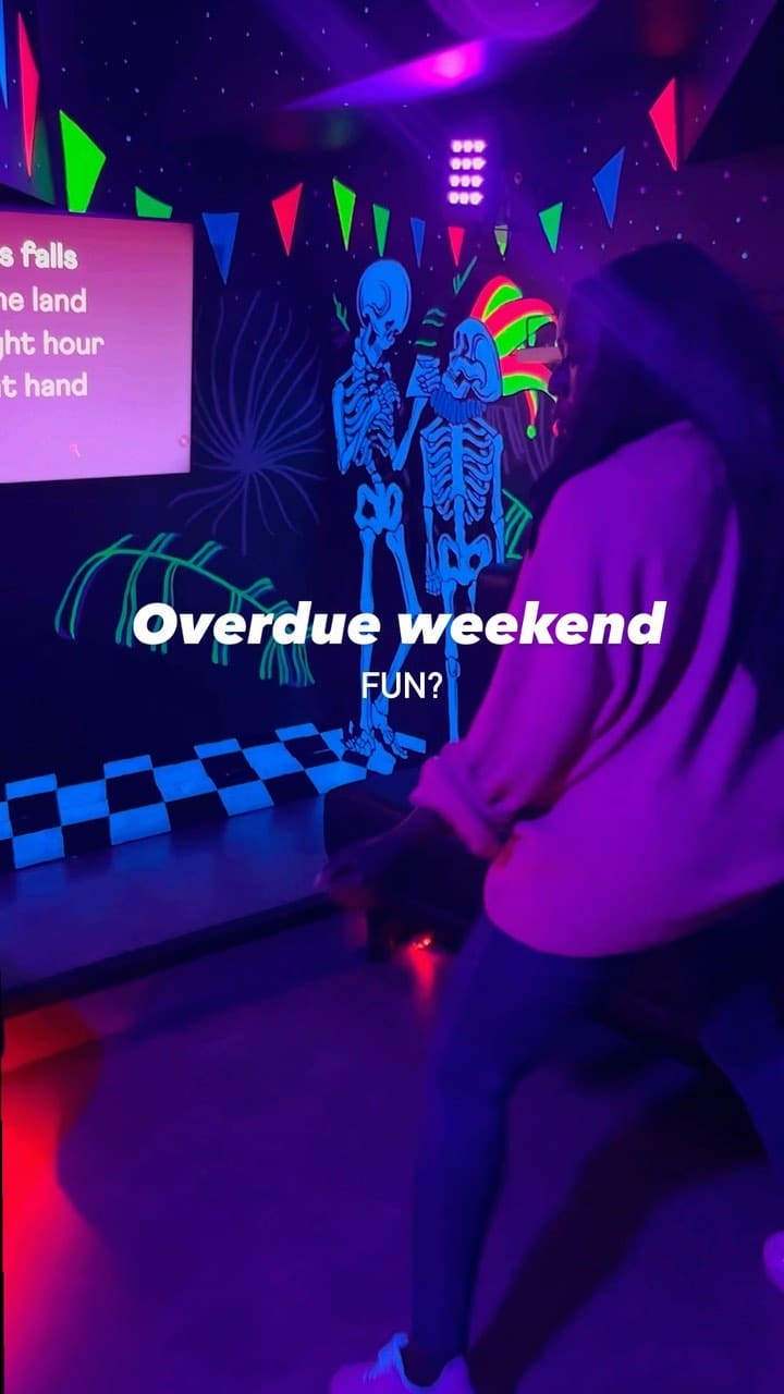 The video showcases Bat and Ball, a multi-play bar in Westfield Stratford City, London. It features various activities like darts, karaoke, and ping pong. The food and drinks shown include cocktails (two different types are shown), and the overall atmosphere is lively and vibrant. The video highlights the bar's features, games, and ordering system, emphasizing the social and fun aspects of the venue.