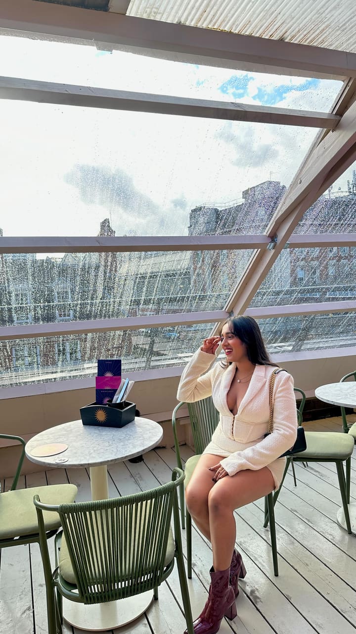 The video showcases a bottomless brunch event at Circes Rooftop bar in London.  It features various food items including burgers, fries, and salads.  The drinks include bottomless cocktails, beer, and prosecco.  The presentation is vibrant and appealing, with the food and drinks attractively displayed. The video primarily focuses on the energetic atmosphere of the brunch, including a drag queen performance and audience participation. Dietary information isn't explicitly provided.