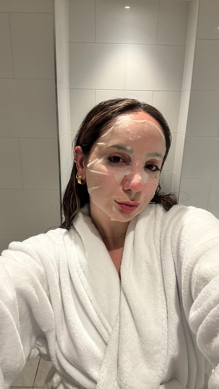 The video showcases a stay at The Clermont hotel in Charing Cross, London. It begins with exterior shots of the grand Victorian building, then moves inside to show opulent hallways and a welcome gift of champagne and chocolate cake. The content features a guest relaxing in a bathrobe, reading, taking a bath, and enjoying coffee. The video highlights a view of the London skyline, including The Shard, from the hotel window, and showcases the hotel's elegant interior design, including a grand staircase and a beautifully decorated bar/restaurant. The video concludes with shots of a full breakfast and a final view of London from the restaurant window.