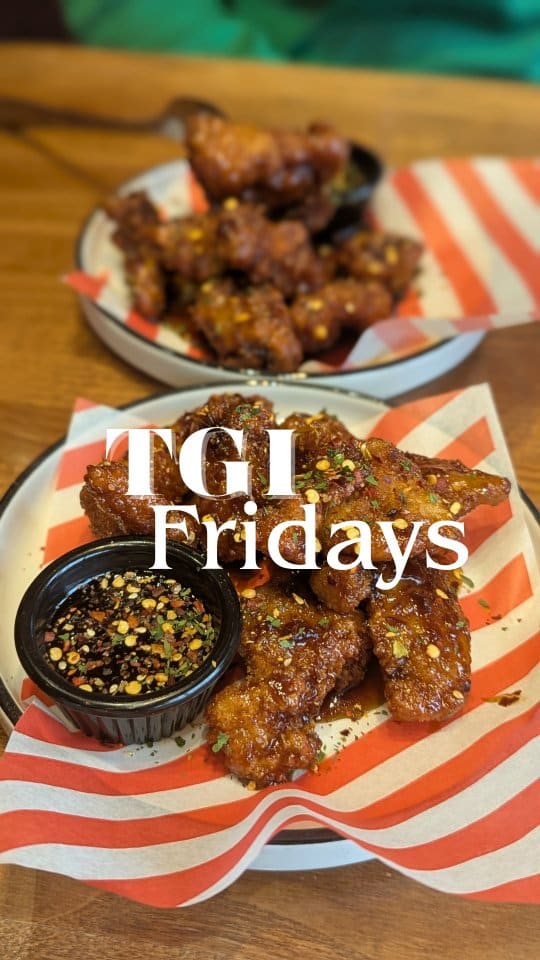 A short, promotional reel highlighting a limited-time bottomless sesame chicken offer at TGI Fridays. The video uses quick cuts to show the venue, the menu, cocktails, and the food being served, effectively demonstrating the 'bottomless' nature of the deal.